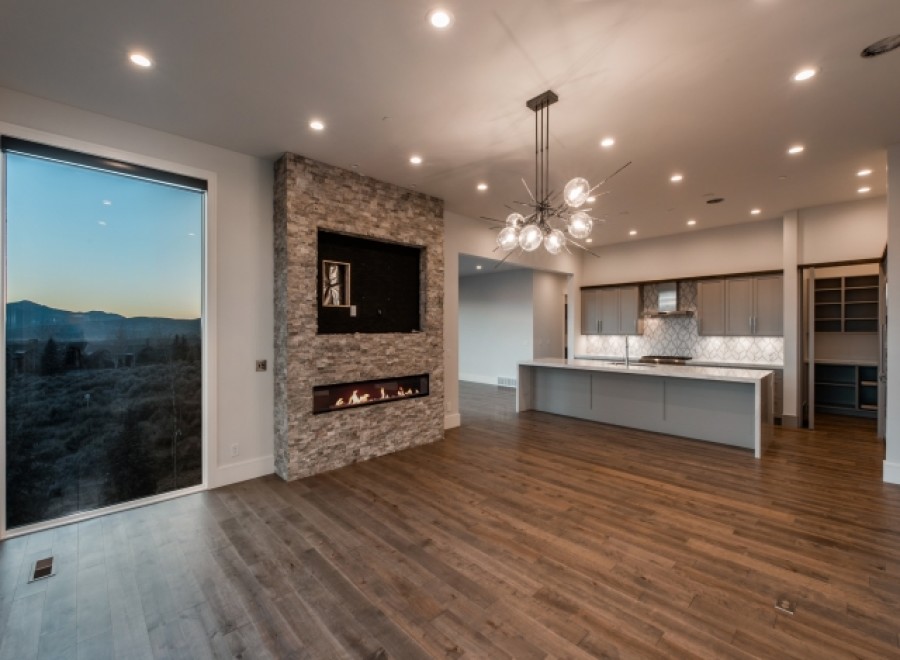 Stunning open-concept living area with expansive windows showcasing breathtaking views.