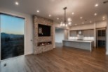 Stunning open-concept living area with expansive windows showcasing breathtaking views.