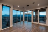 Stunning mountain views from this luxurious home's expansive windows.