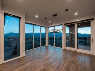 Stunning mountain views from this luxurious home's expansive windows.