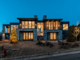 Luxury mountain home with stunning nighttime views.