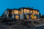 Luxury mountain home with stunning nighttime views.