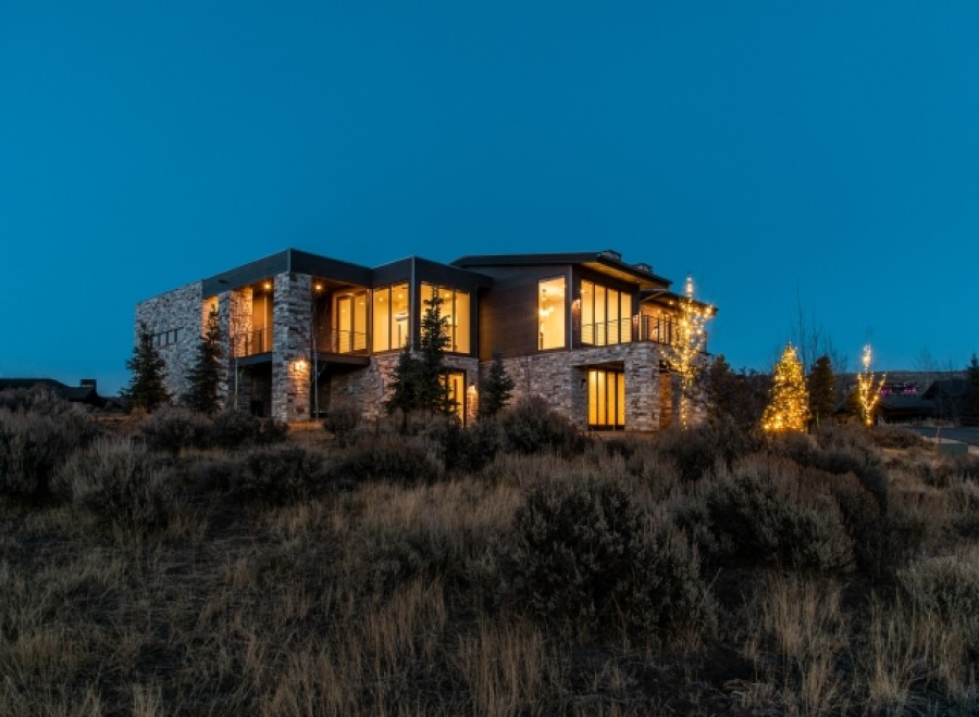 Luxury mountain home with stunning nighttime views.