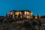 Luxury mountain home with stunning nighttime views.