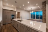 Stunning kitchen with expansive island and high-end finishes.