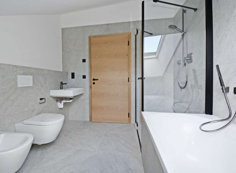 This modern bathroom boasts a sleek design with a focus on functionality and style.