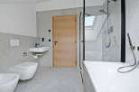 This modern bathroom boasts a sleek design with a focus on functionality and style.