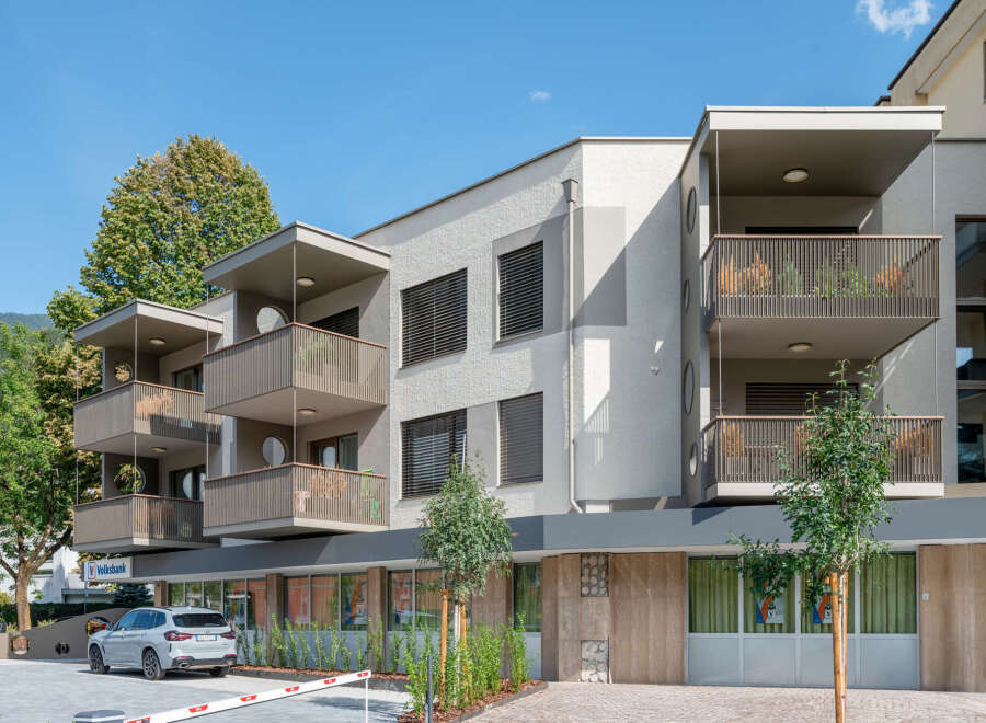 Discover modern living in this stunning apartment building featuring spacious balconies with scenic views and contemporary architecture.