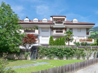 Discover this charming multi-unit property nestled amidst lush greenery and scenic mountain views.