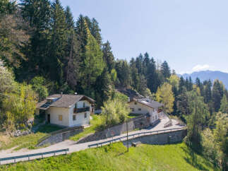 Nestled amidst the breathtaking beauty of the mountains, this charming property offers a serene escape.