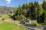 Nestled in a picturesque mountain setting, this charming property offers a tranquil escape.