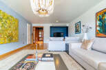 Step into luxury with this stunning living room, featuring a modern design and elegant decor.