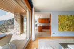 Experience luxury living in this stunning property, featuring breathtaking mountain views from a spacious balcony.