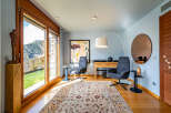 Experience luxury living in this stunning property, featuring a bright and airy living room with breathtaking mountain views.