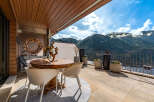 Experience breathtaking mountain views from this stunning property.
