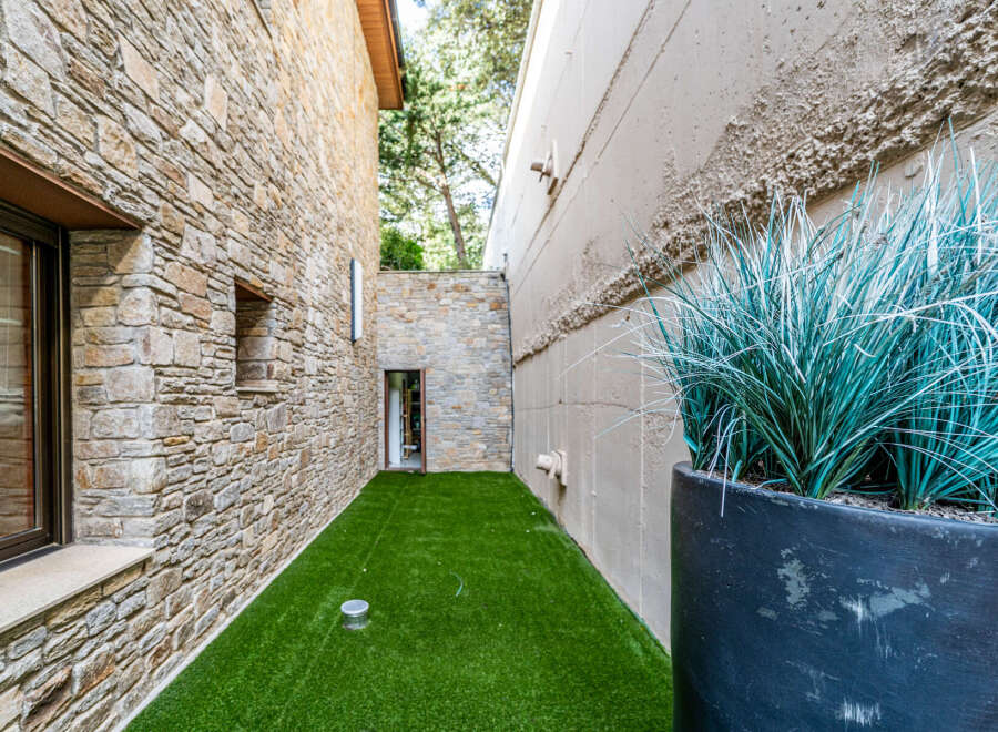 Discover the charm of this unique property, featuring a stunning stone facade that exudes timeless elegance.
