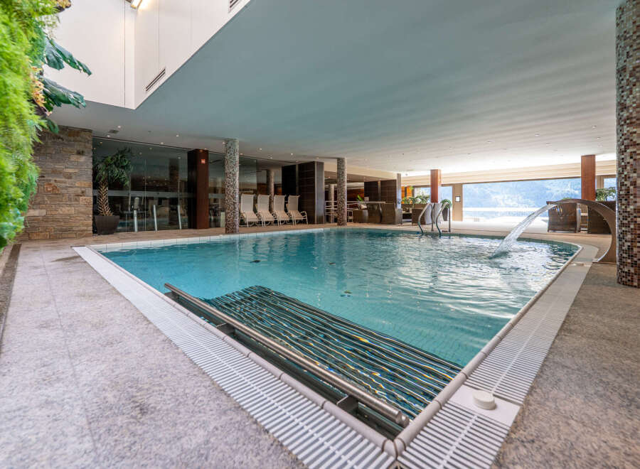 Experience luxury and relaxation in this stunning indoor pool.