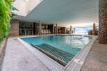 Experience luxury and relaxation in this stunning indoor pool.