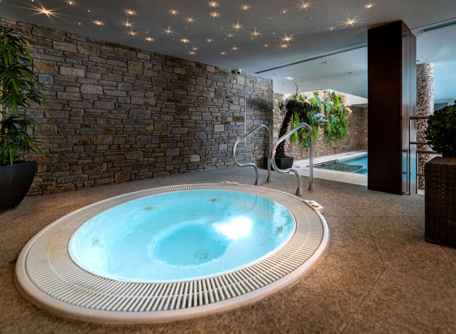 Indulge in luxury at this spa-like retreat, featuring a stunning jacuzzi.