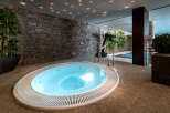 Indulge in luxury at this spa-like retreat, featuring a stunning jacuzzi.