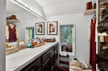 Step into luxury with this stunning vanity area, perfect for getting ready in style.