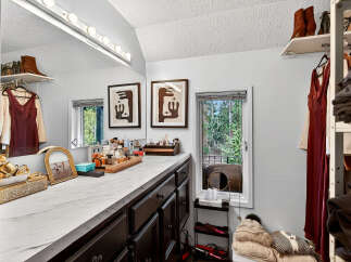 Step into luxury with this stunning vanity area, perfect for getting ready in style.