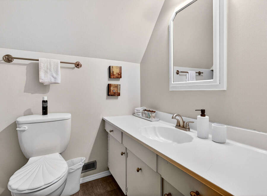 This charming bathroom features a clean and modern design with a bright, airy feel.