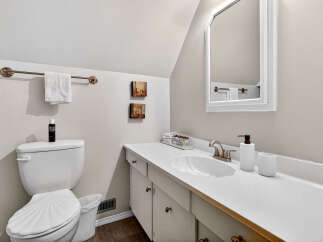 This charming bathroom features a clean and modern design with a bright, airy feel.