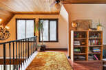 Step into this inviting space, featuring a warm and welcoming ambiance.