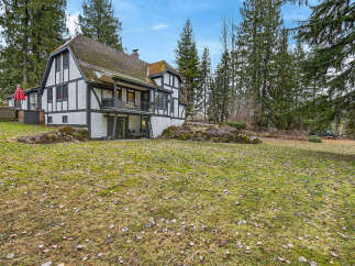 Discover the charm of this stunning property, showcasing a unique architectural design.