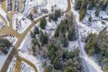 Nestled in a winter wonderland, this property offers a serene escape.