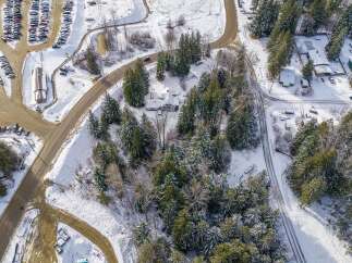 Nestled in a winter wonderland, this property offers a serene escape.