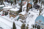 Nestled in a snowy mountain landscape, this property offers a unique blend of comfort and natural beauty.