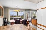 This stunning dining area offers breathtaking views of the surrounding landscape, perfect for enjoying meals with family and friends.