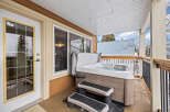 Relax and unwind in your own private oasis! This stunning property features a luxurious hot tub, perfect for enjoying the outdoors in any season.