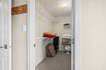 Step into this well-organized closet, perfect for maximizing storage space.