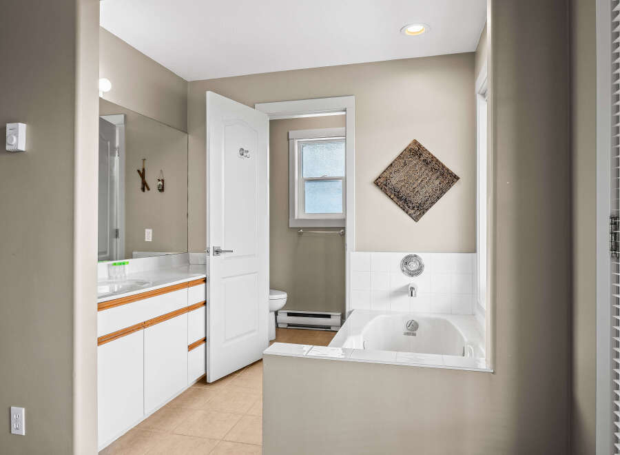 Step into this inviting bathroom, featuring a bright and airy design.