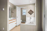 Step into this inviting bathroom, featuring a bright and airy design.