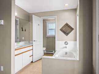 Step into this inviting bathroom, featuring a bright and airy design.