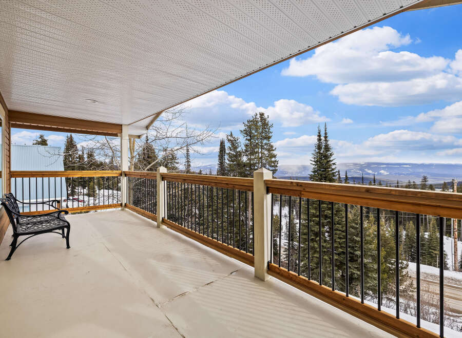 Enjoy breathtaking mountain views from this stunning balcony.