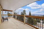 Enjoy breathtaking mountain views from this stunning balcony.