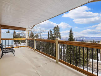 Enjoy breathtaking mountain views from this stunning balcony.