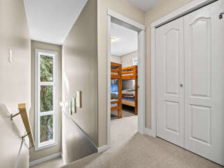 Step into this inviting home and discover a hallway leading to a cozy bedroom.