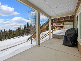Enjoy breathtaking mountain views from this charming property.