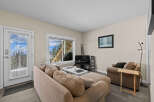 This cozy living space features a comfortable sofa, perfect for relaxing after a long day.