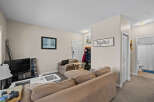 This cozy living space features a comfortable sectional sofa, perfect for relaxing.