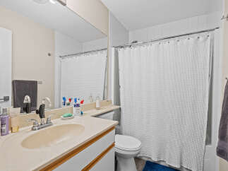 This bathroom features a clean and modern design, perfect for any home.