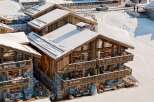 Experience luxury living in this stunning ski chalet, nestled in a picturesque winter wonderland.