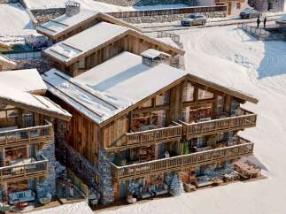Experience luxury living in this stunning ski chalet, nestled in a picturesque winter wonderland.