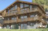 Discover the charm of this stunning wooden chalet, a perfect blend of rustic elegance and modern design.